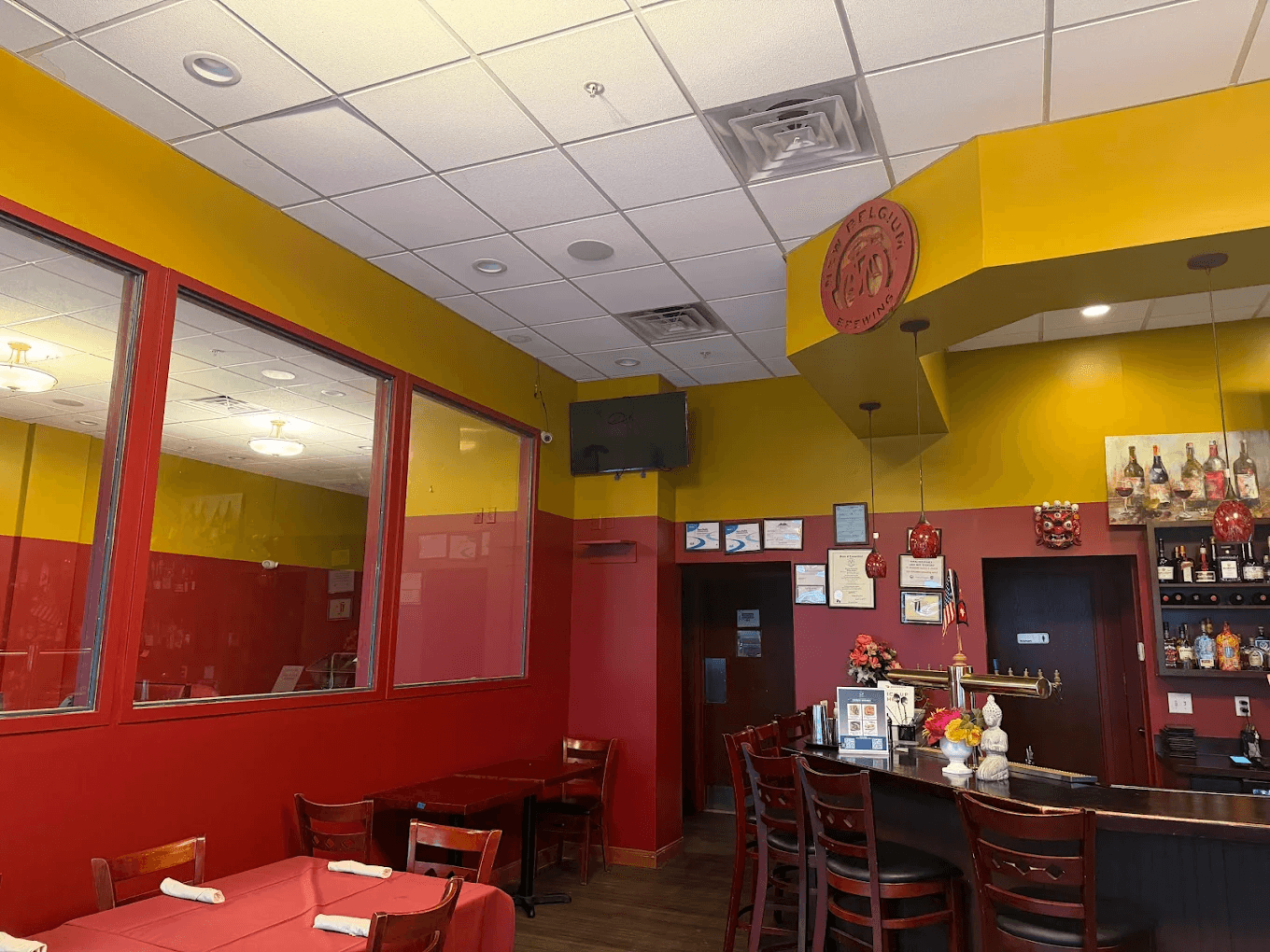 The dining room at Kathmandu Kitchen & Bar — warm ambiance, full bar